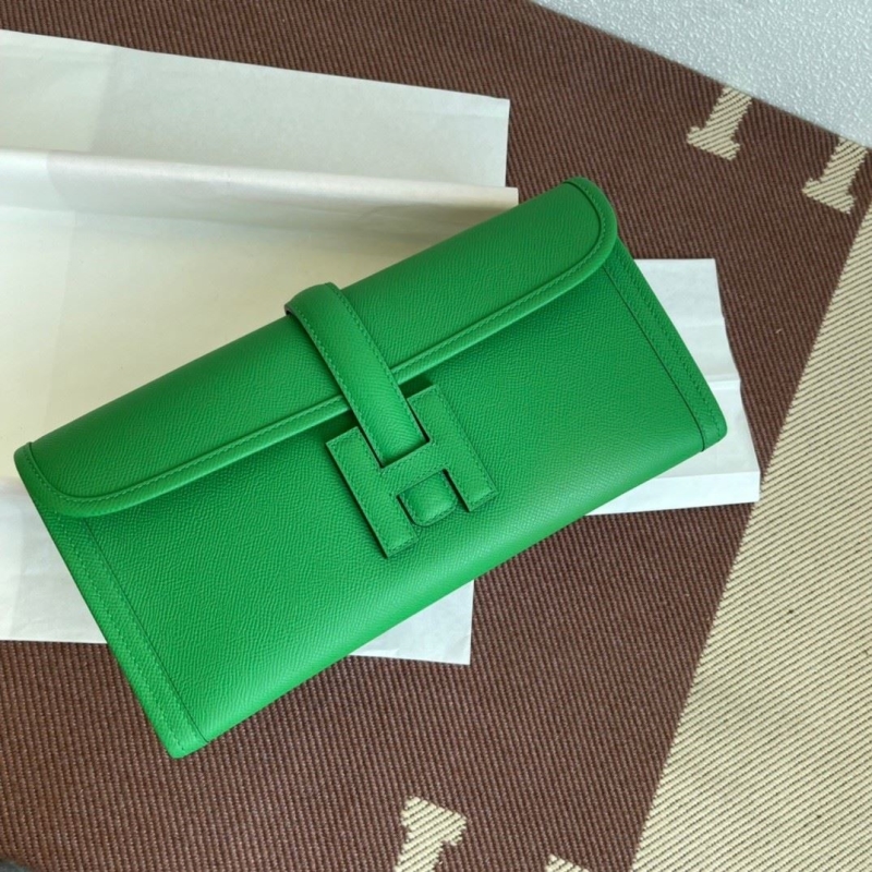 H**mes clutch bags